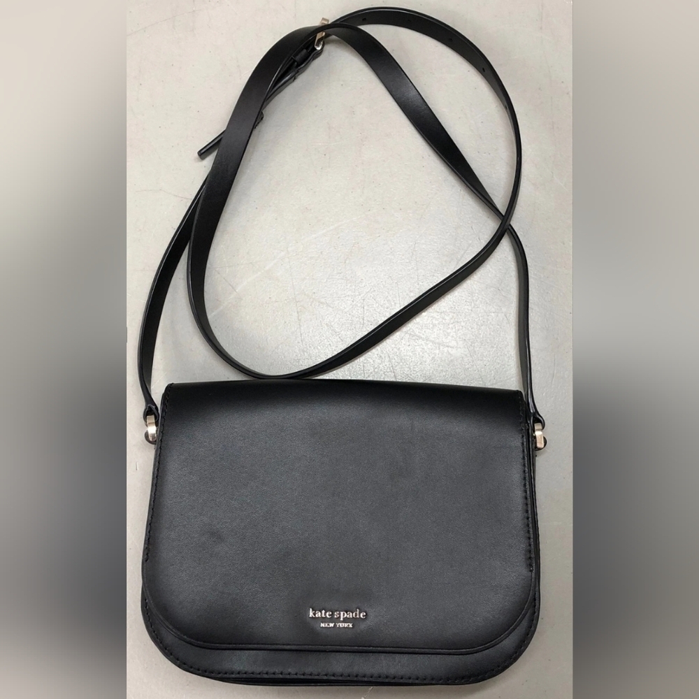 Kate Spade Black Leather Crossbody Bag with Curved Silhouette.